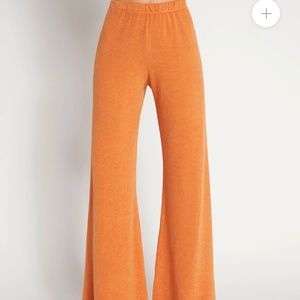 Suzie Kondi Beach Terry orange flare pants size small